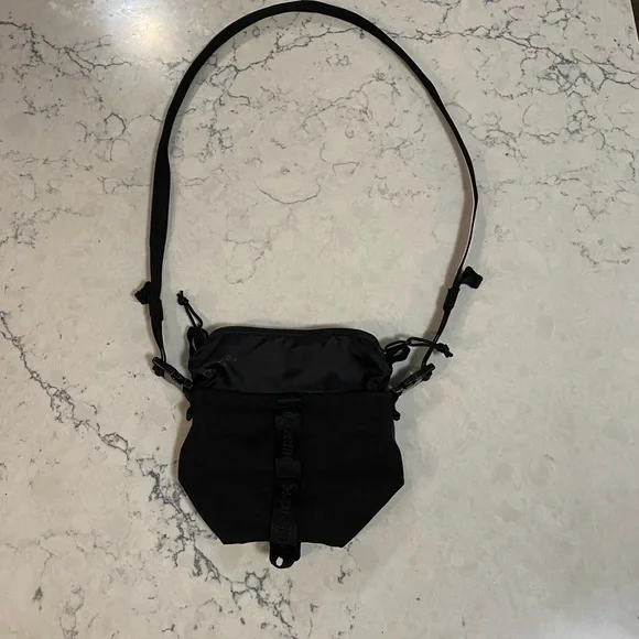 Black supreme cross body bag